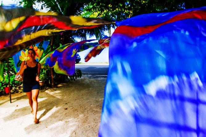 Bora Bora: Half Day Island 4WD Guided Tour - Faanui Valley: sarongs, coconut oil, and fruit