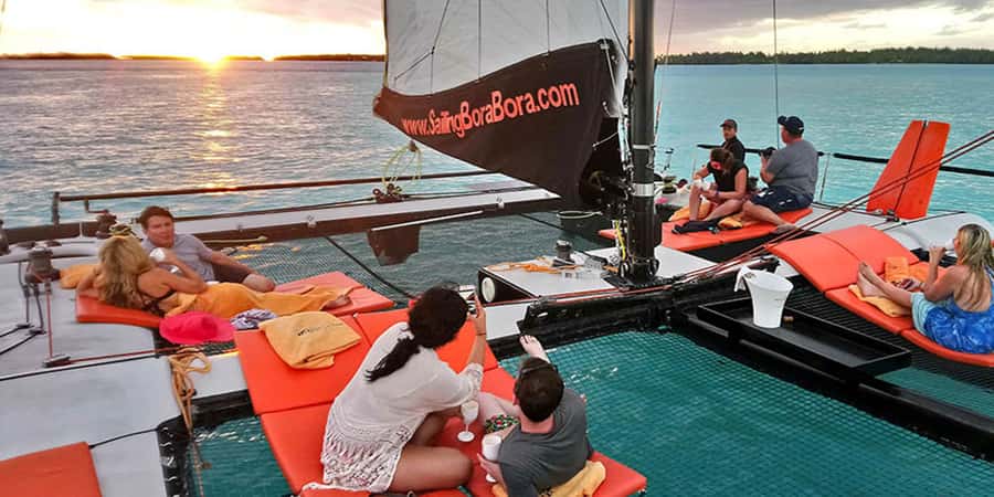 Bora Bora: Sunset Catamaran Cruise with Snacks and Drinks - Setting out from your hotel dock
