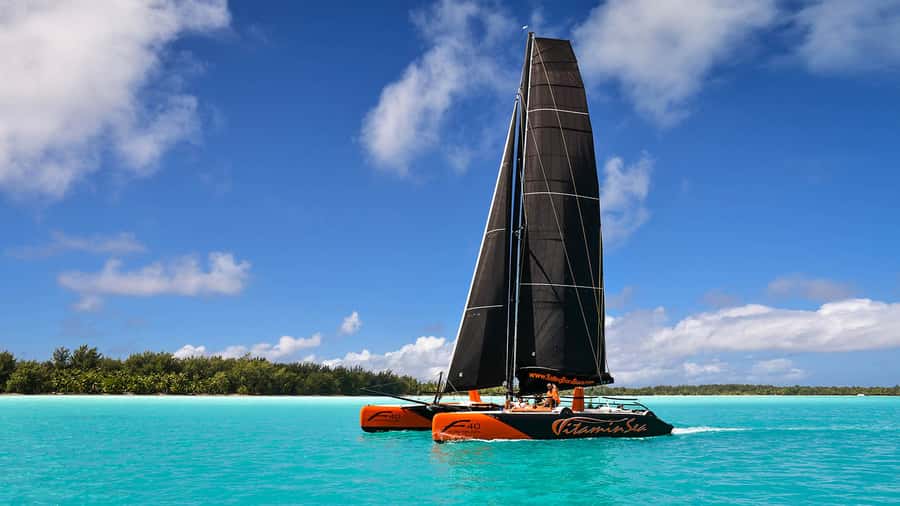 Bora Bora: Sunset Catamaran Cruise with Snacks and Drinks - The scenery: clear water, steep mountains, and open sky