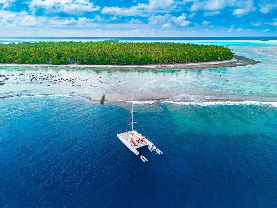 From Tahiti: Tetiaroa Island Tour by Sailing Catamaran - Meeting the crew before sunrise at Papeete Marina