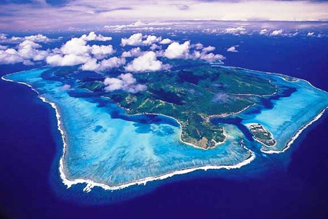 Private 30-minute flight downwind of Huahine - The bay that gives Huahine its shape