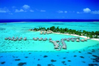 Private flight, in a light plane over the Polynesian motus from Raiatea