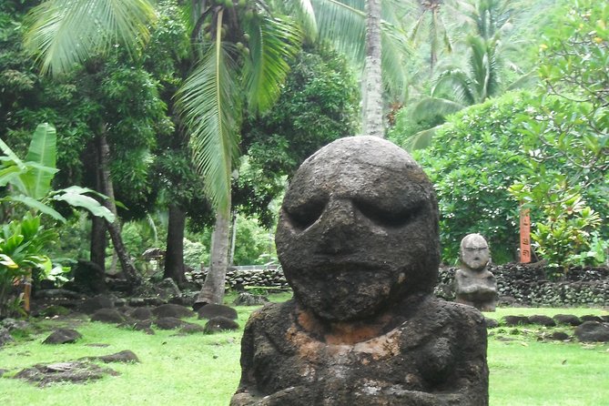 private Tahiti island discovery - Vaipahi Water Gardens: flowers, trees, and a small waterfall