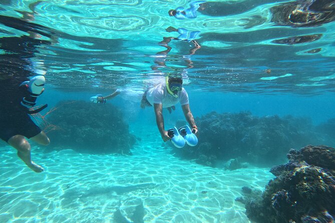 Snorkeling EN Underwater Scooter in Tahiti - Learning to handle the sea scooter