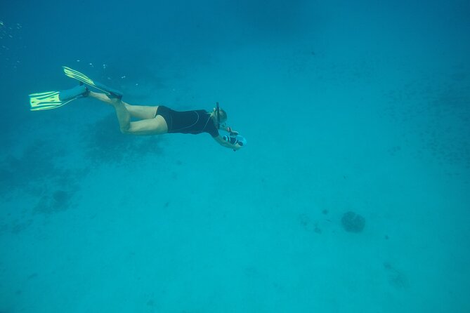 Snorkeling EN Underwater Scooter in Tahiti - Plane, boats, and the lagoon’s underwater stories