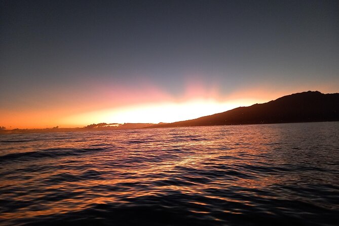 Sunset sailing trip on the Lagoon of Tahiti - Sailing toward a Tahitian sunset