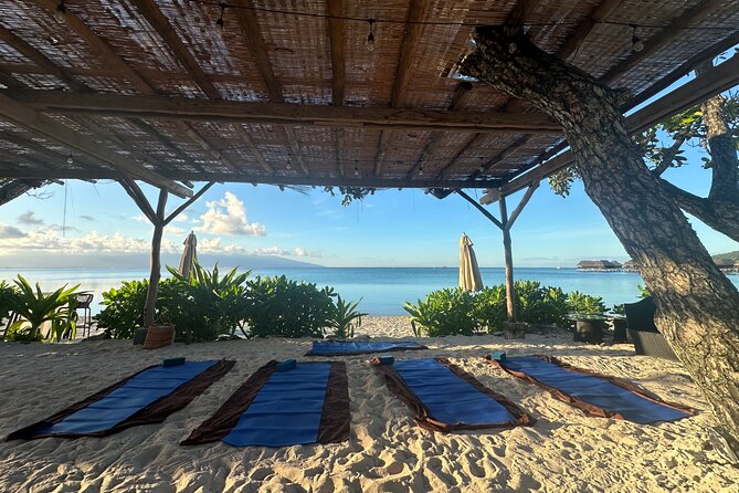 Yoga at sunrise at Sofitel Moorea, overlooking Tahiti - Key points for your Moorea morning